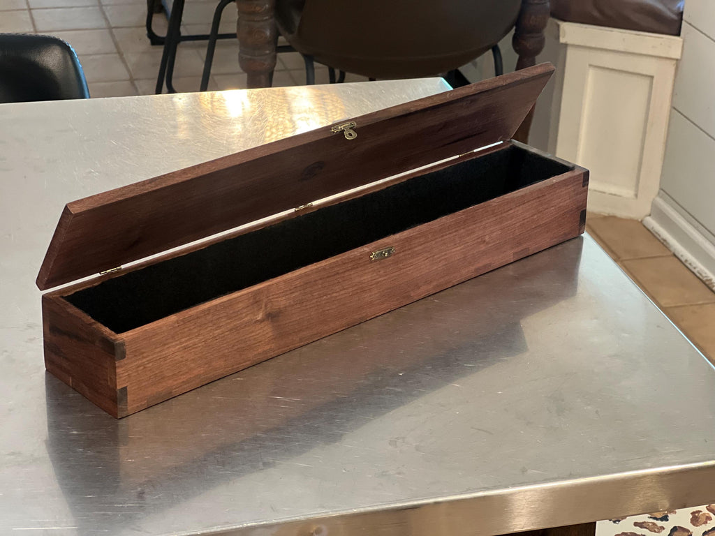 This is a black walnut custom-made carrying case / handmade