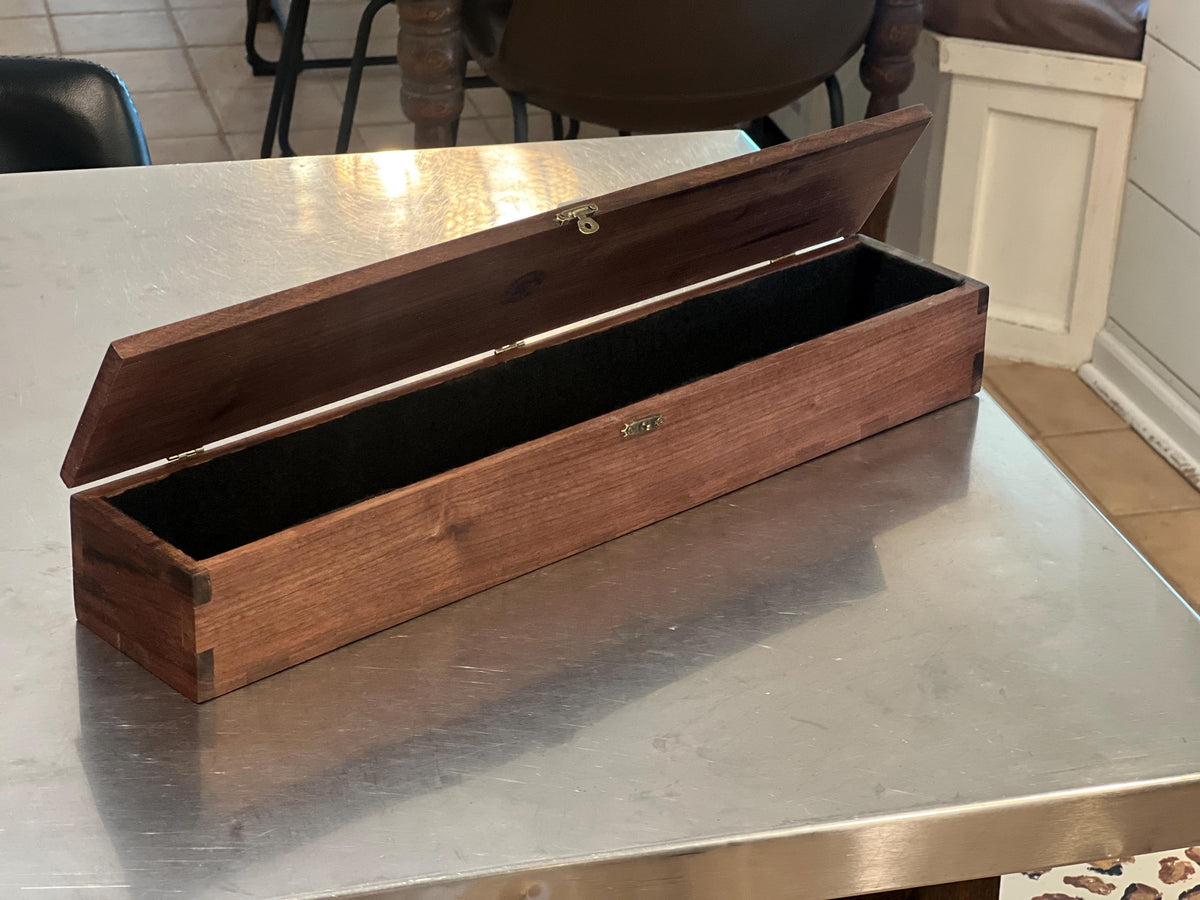 This is a black walnut custom-made carrying case / handmade