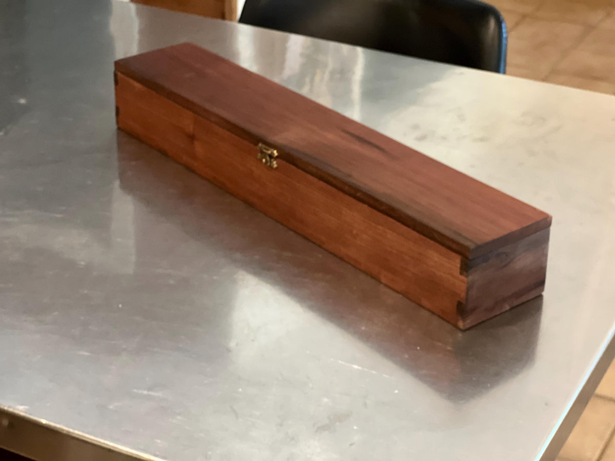 This is a black walnut custom-made carrying case / handmade