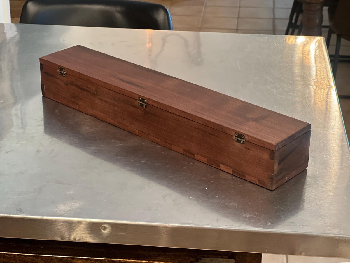 This is a black walnut custom-made carrying case / handmade