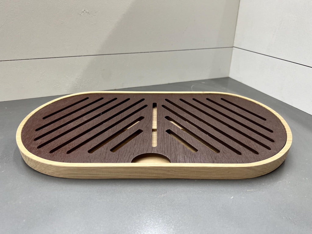 This is a made to order French bread, crumb tray/cutting board. It is made from walnut and maple or white oak.