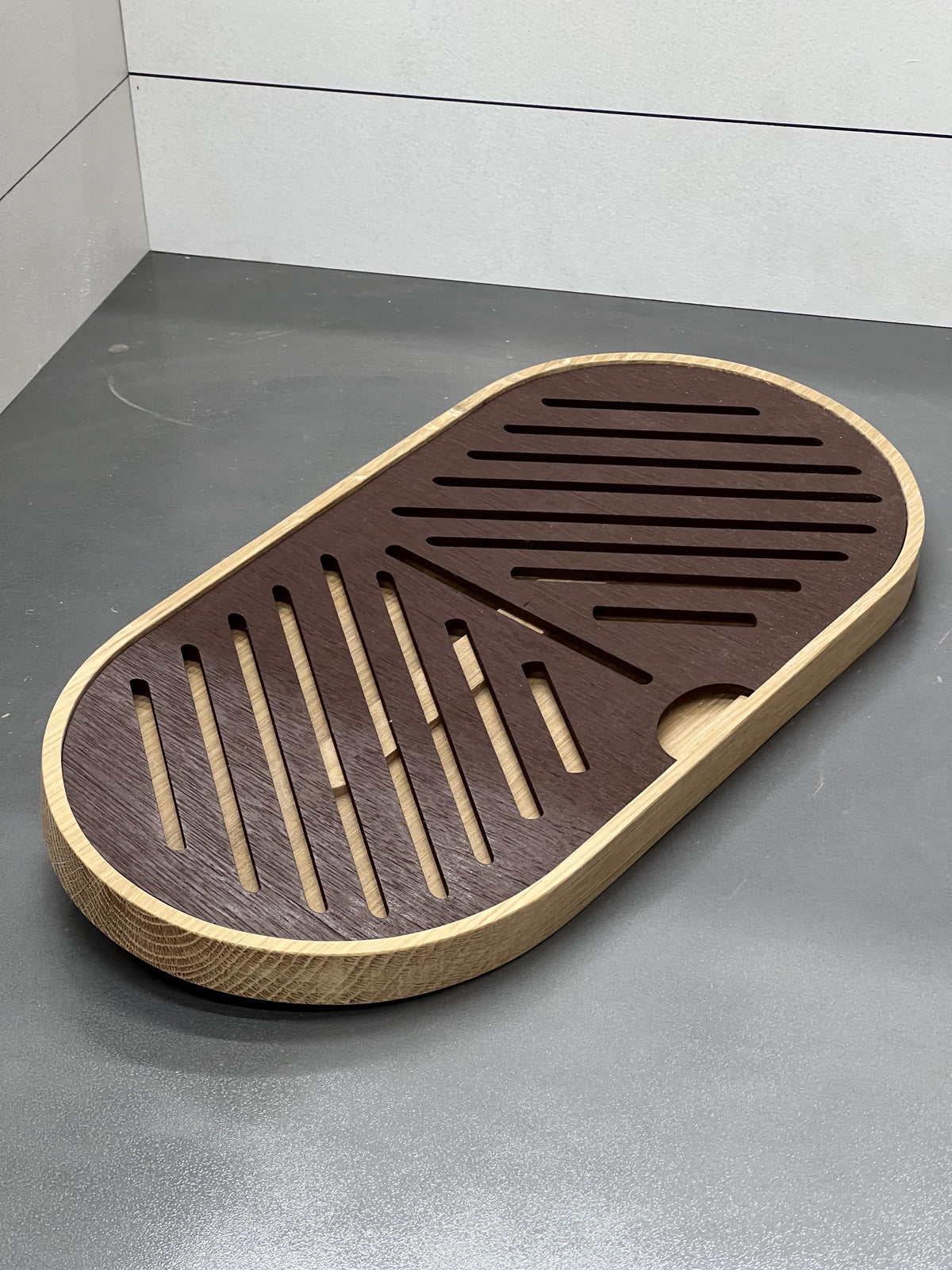 This is a made to order French bread, crumb tray/cutting board. It is made from walnut and maple or white oak.