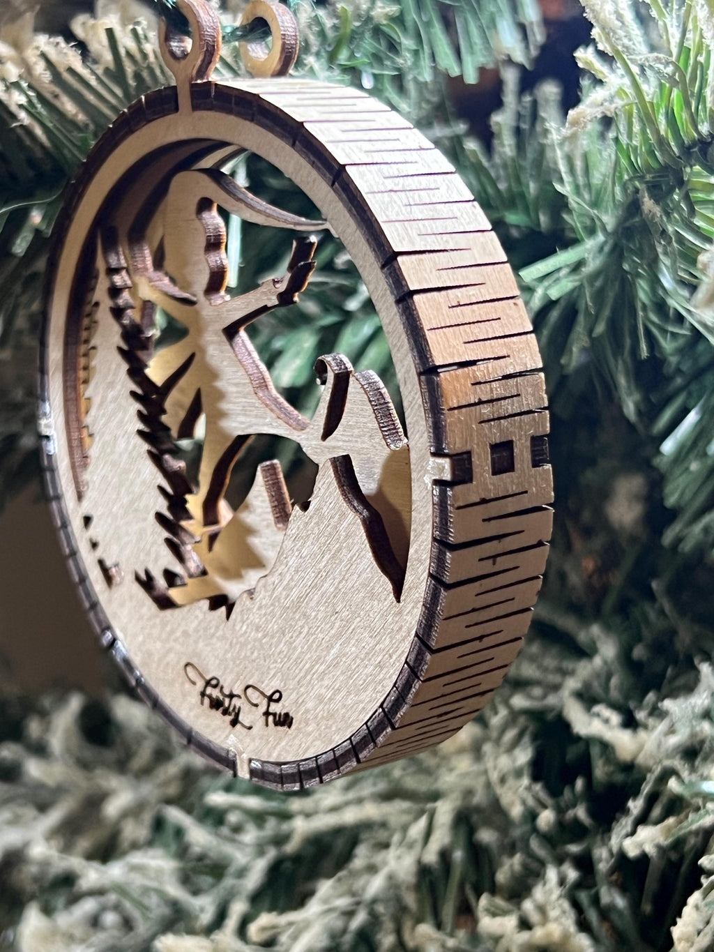 Handcrafted three-dimensional wooden ornament