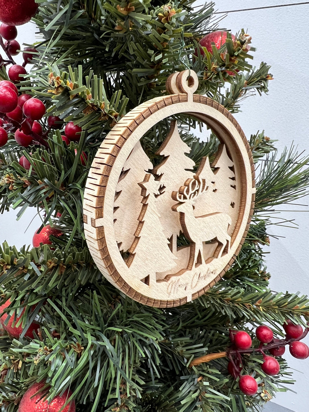 Handcrafted Round Wooden Christmas Ornament with Winter Scene
