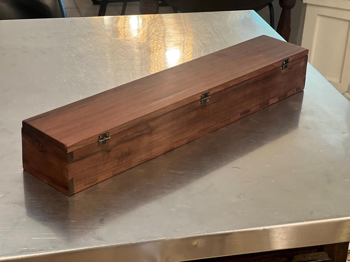 This is a black walnut custom-made carrying case / handmade