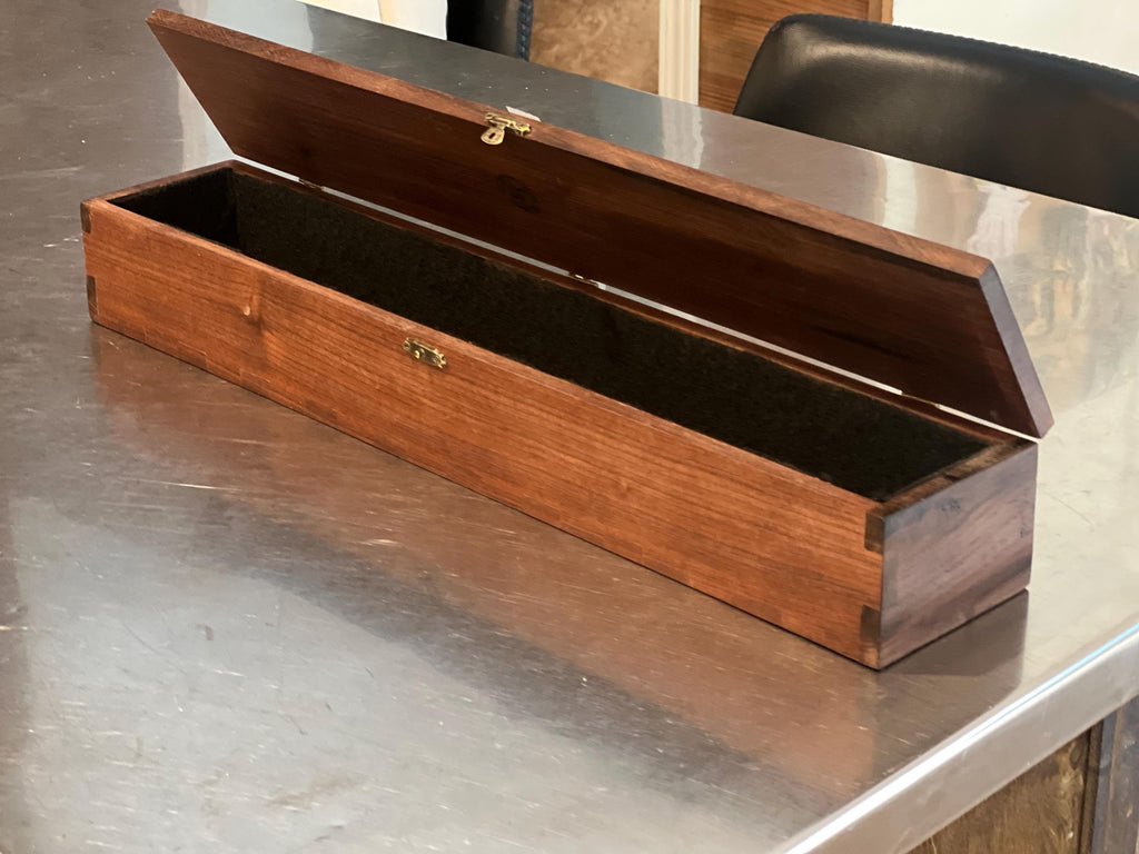 This is a black walnut custom-made carrying case / handmade