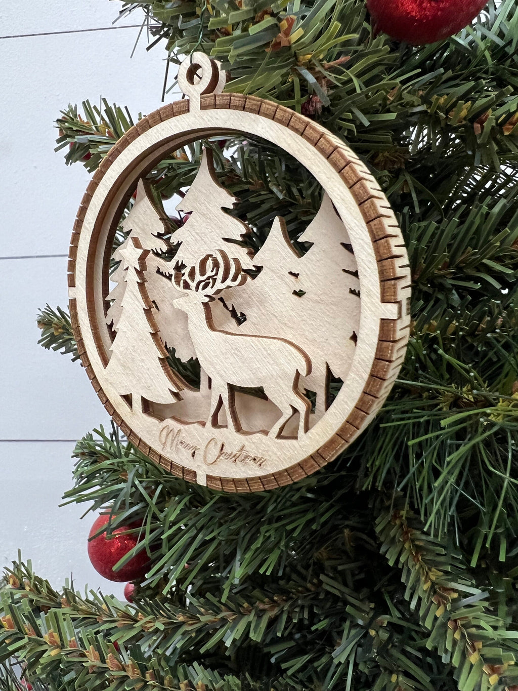 Handcrafted Round Wooden Christmas Ornament with Winter Scene