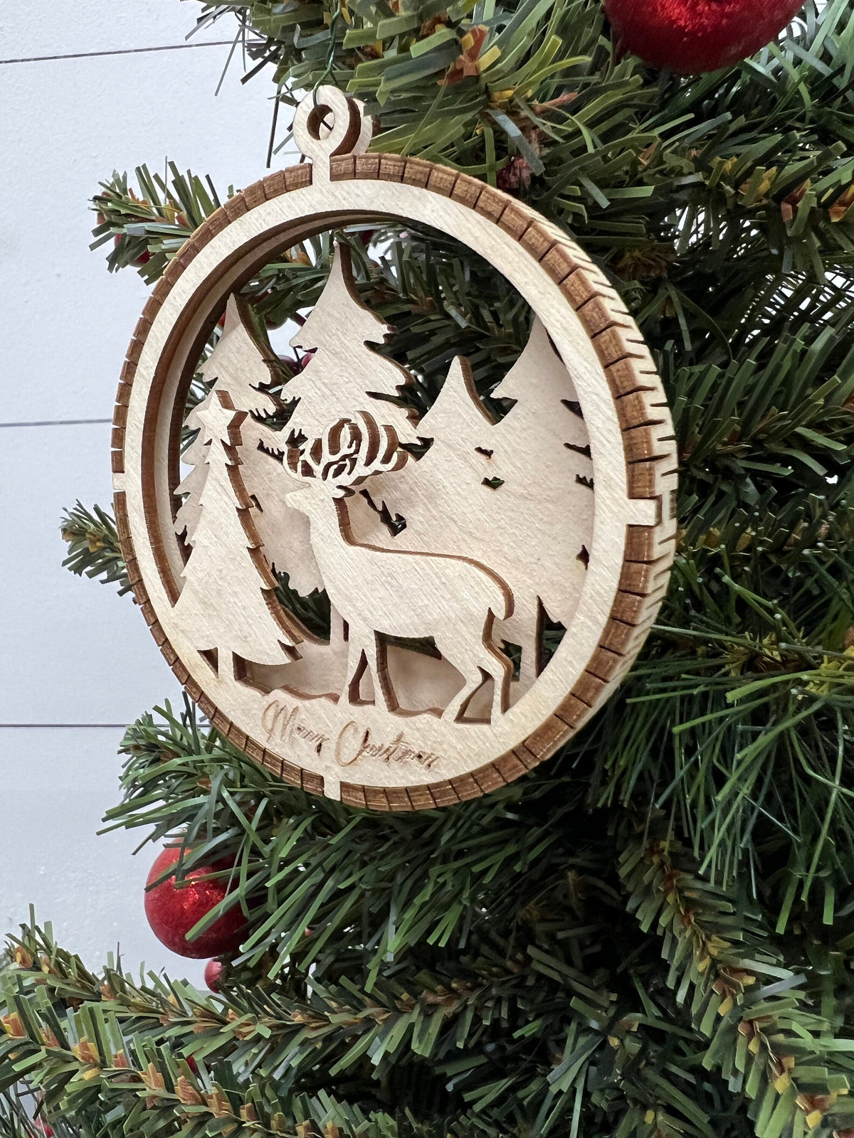Handcrafted Round Wooden Christmas Ornament with Winter Scene
