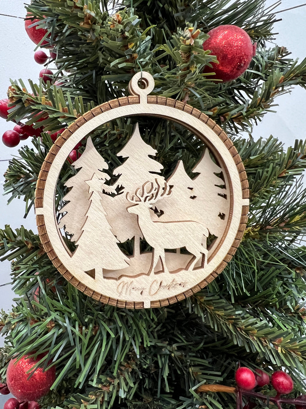 Handcrafted Round Wooden Christmas Ornament with Winter Scene
