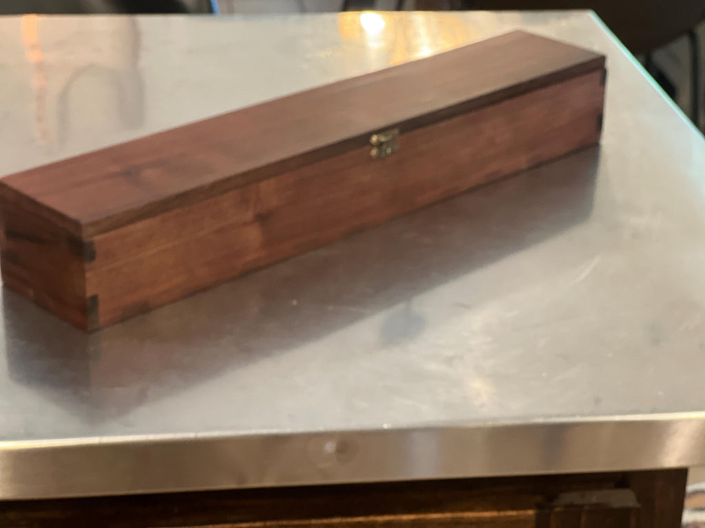 This is a black walnut custom-made carrying case / handmade